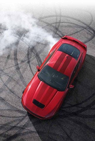 Overhead view of a 2024 Ford Mustang® model with tire tracks on pavement | Glenwood Springs Ford, Inc. in Glenwood Springs CO