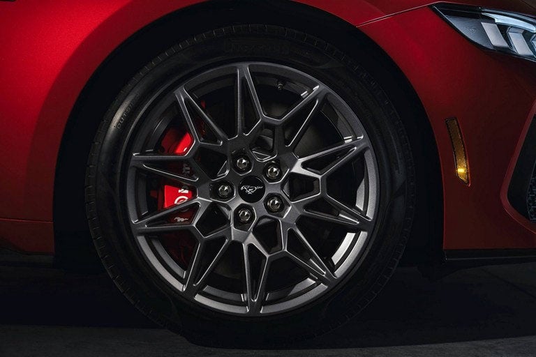 2024 Ford Mustang® model with a close-up of a wheel and brake caliper | Glenwood Springs Ford, Inc. in Glenwood Springs CO